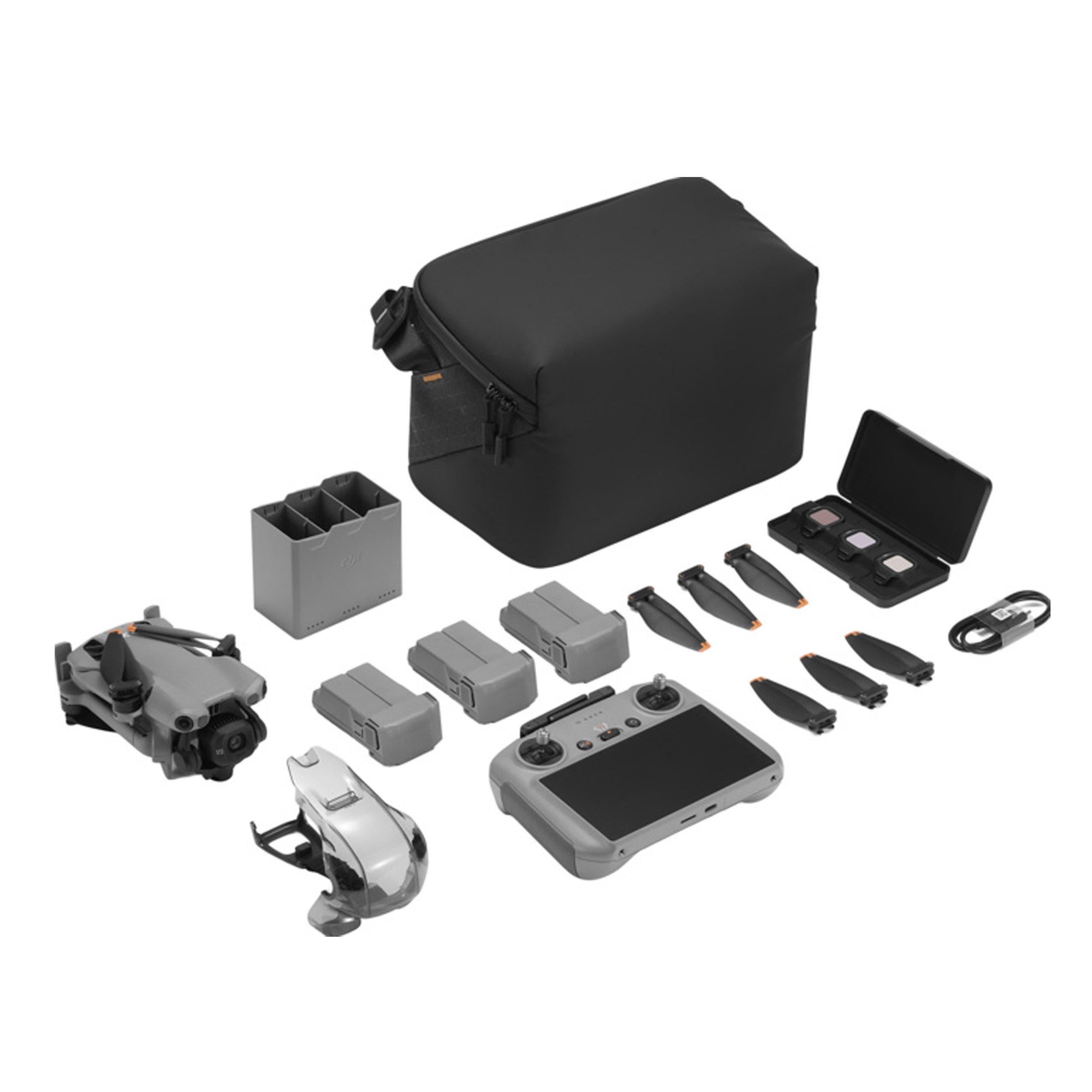 DJI Mini 5 Pro Fly More Ansicht gesamtes Paket mit Akkus, Tasche, Ladestation,  ND Filter und Ersatzrotoren 